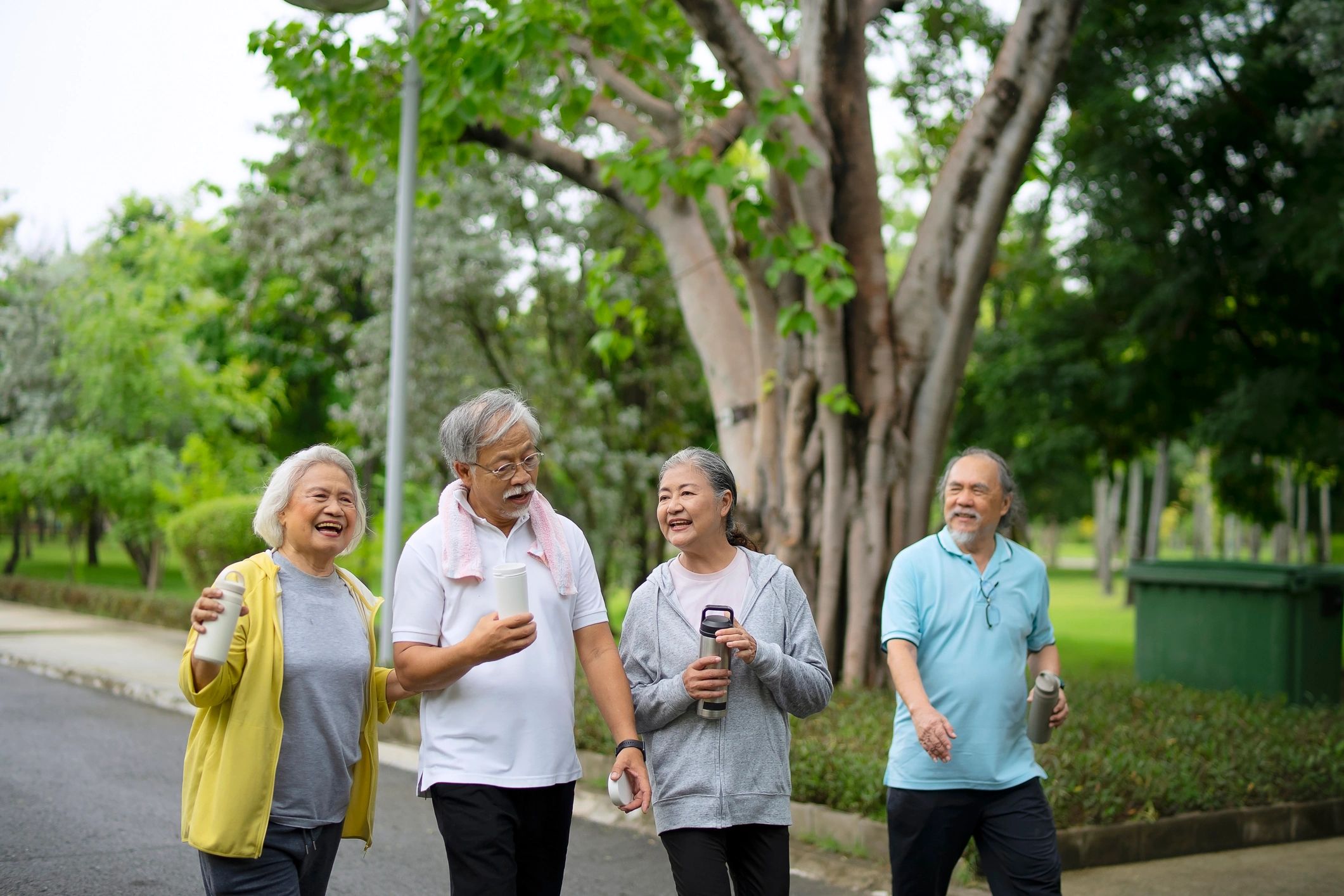 Adults exercising together outdoors as part of a healthy lifestyle routine