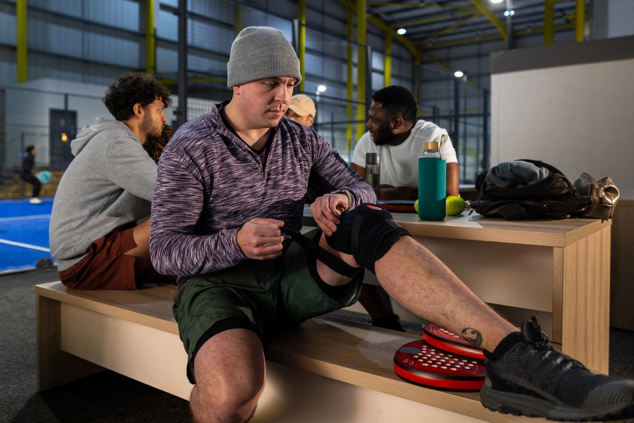 Athlete preparing for training with focus on recovery and injury prevention