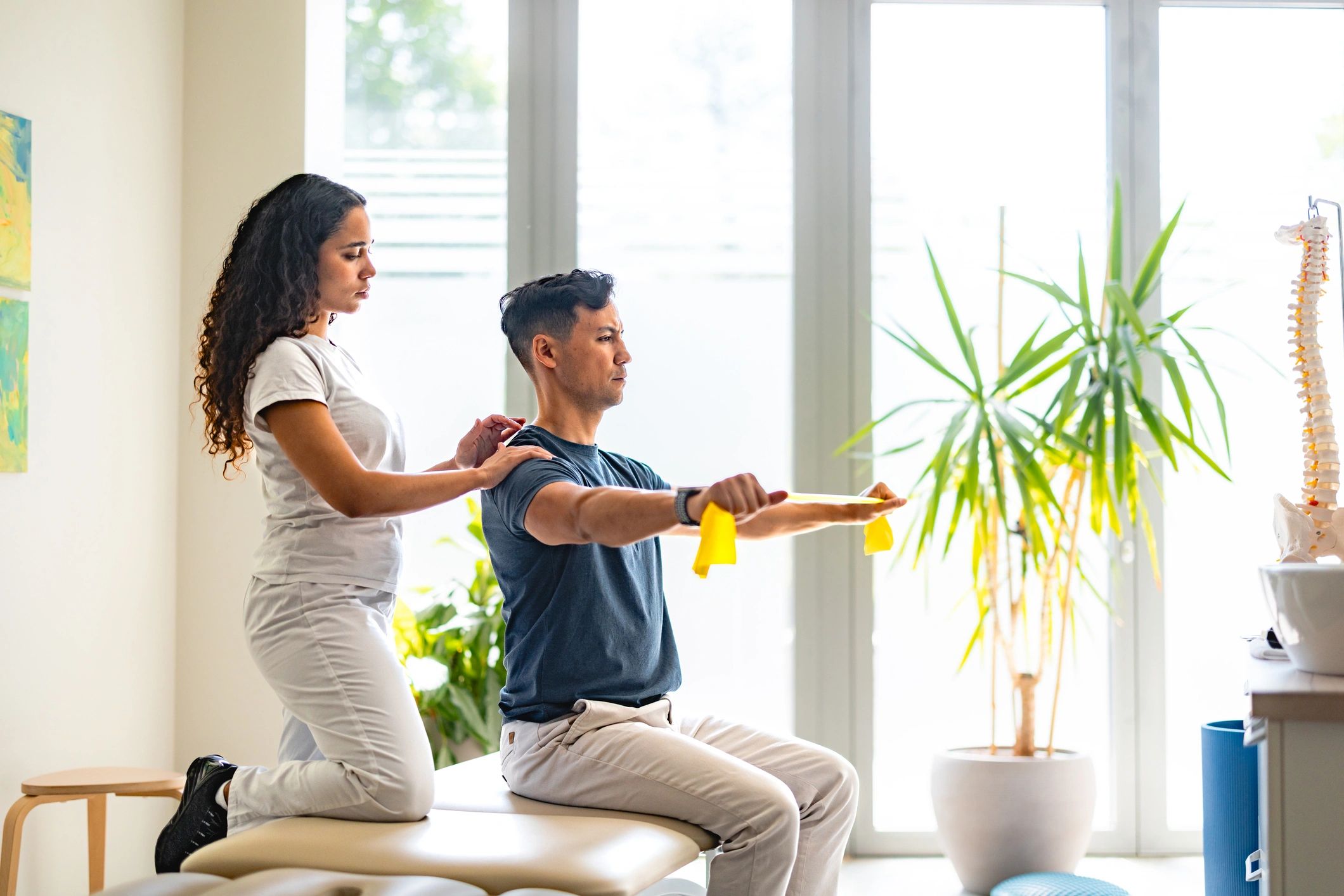 Patient working with a clinician during a guided wellness session